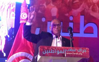Marzouki fait signe de "rabaa" en soutien à Morsi